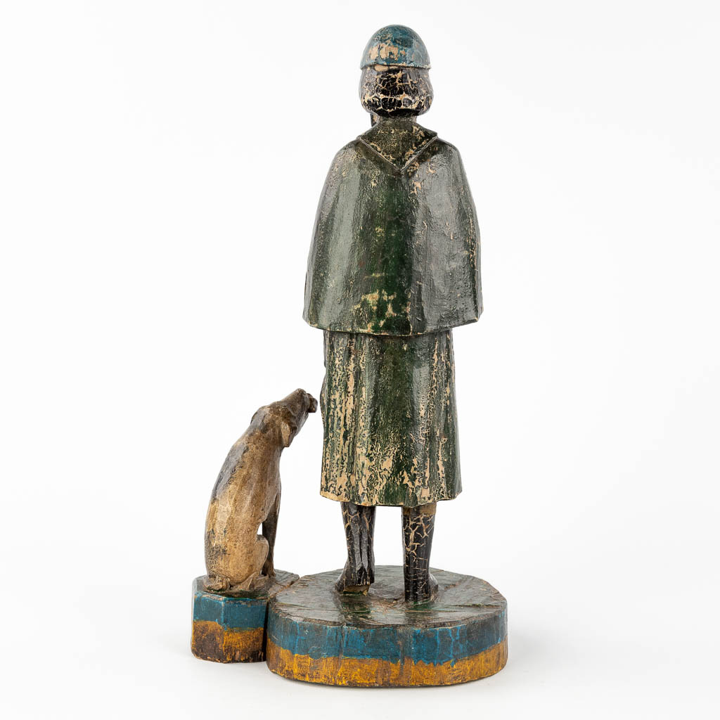 Een antieke houtsculptuur van Heilige Rochus en zijn hond. 19de eeuw. (L: 14 x W: 19,5 x H: 37 cm)
