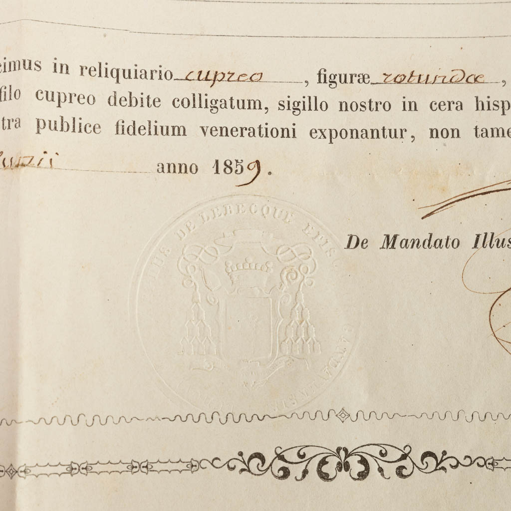 A sealed theca with a relic: Ex Ossibus Sancti Quintii Martyris