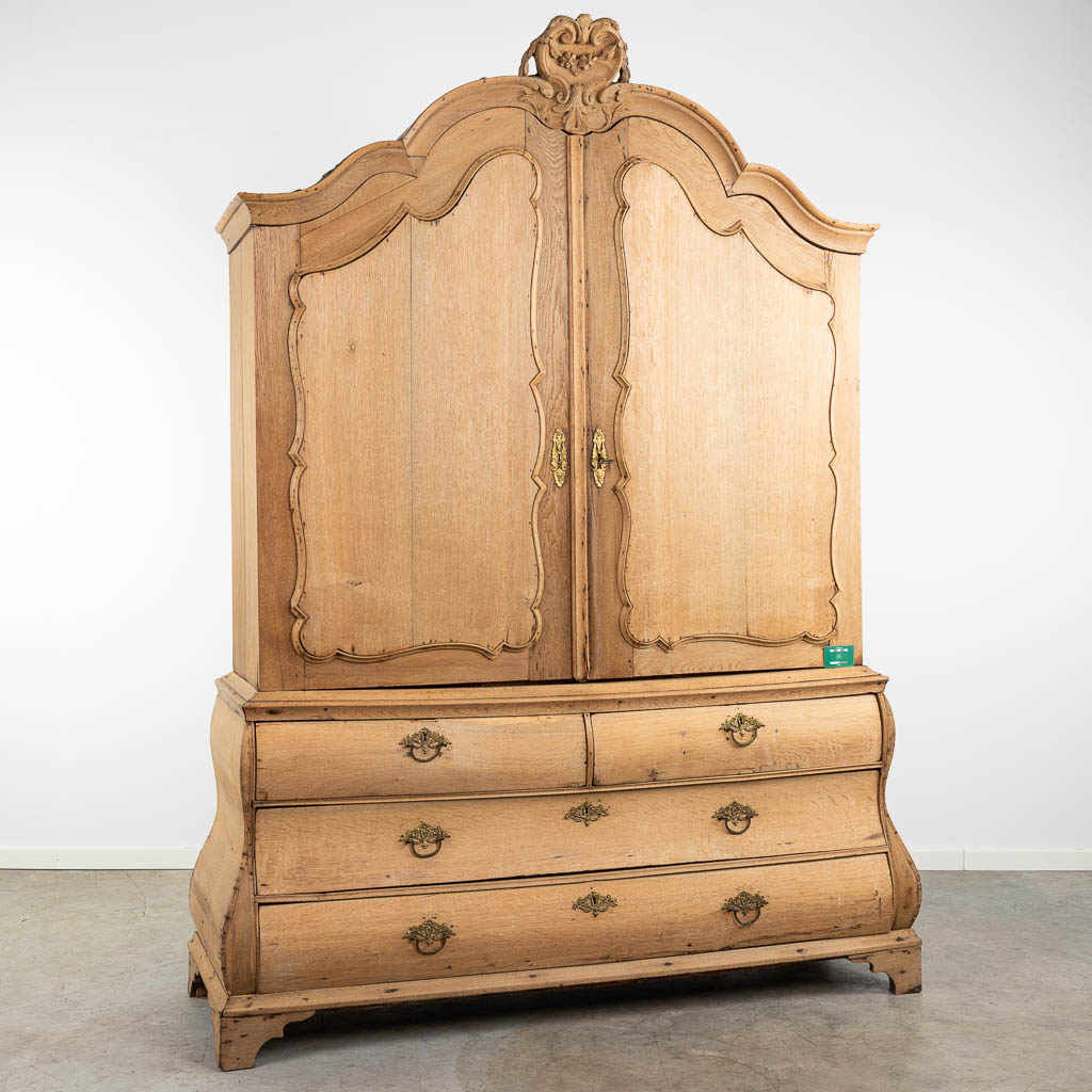 A stripped Dutch cabinet made of oak, 18th century. (H:245cm)