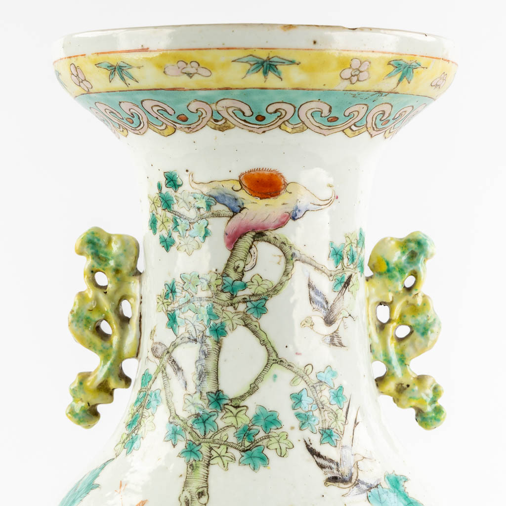 A Chinese Vase, Famille Rose decorated with Fauna and Flora. (H:60 x D:25 cm)