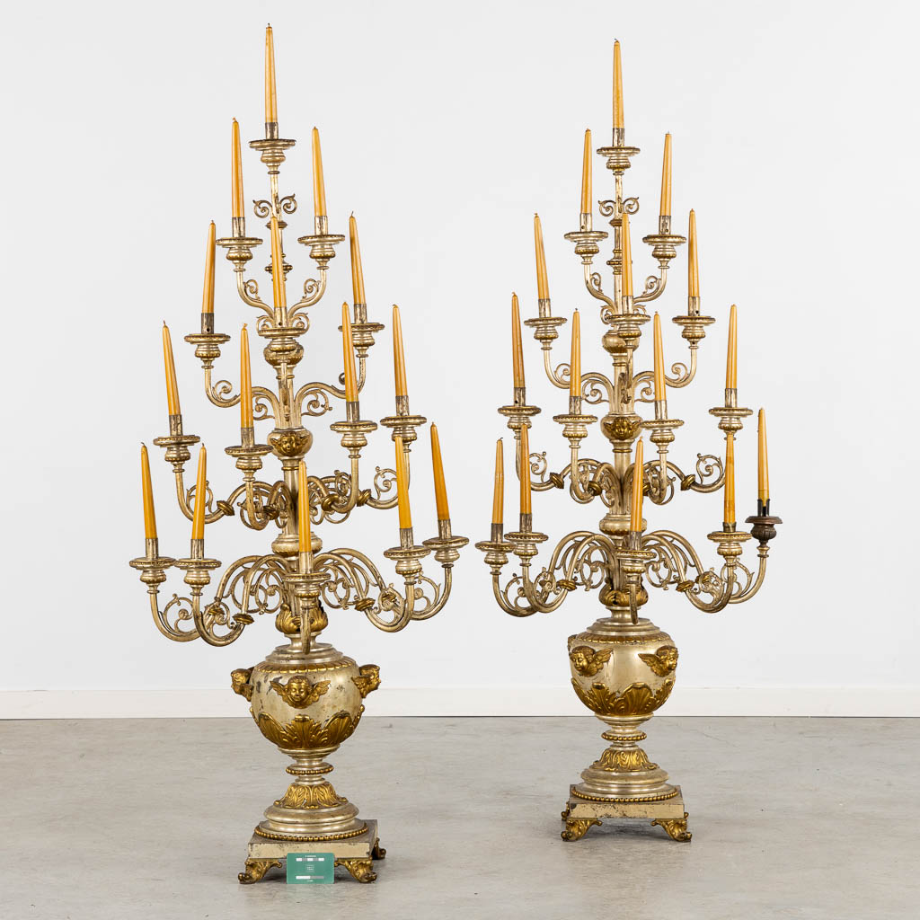 An impressive pair of candelabra, 15 candles, gold and silver-plated metal. (L:44 x W:60 x H:138 cm)
