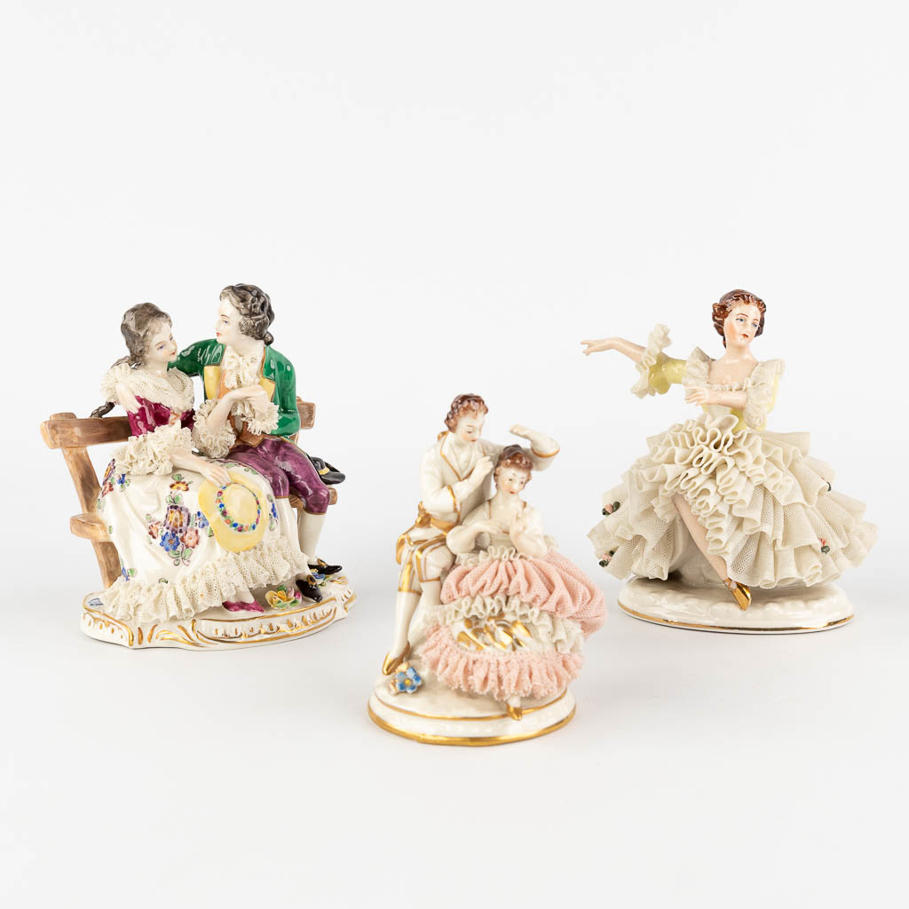  A collection of 3 porcelain figurines with porcelain lace dresses, Germany, 20th century. 
