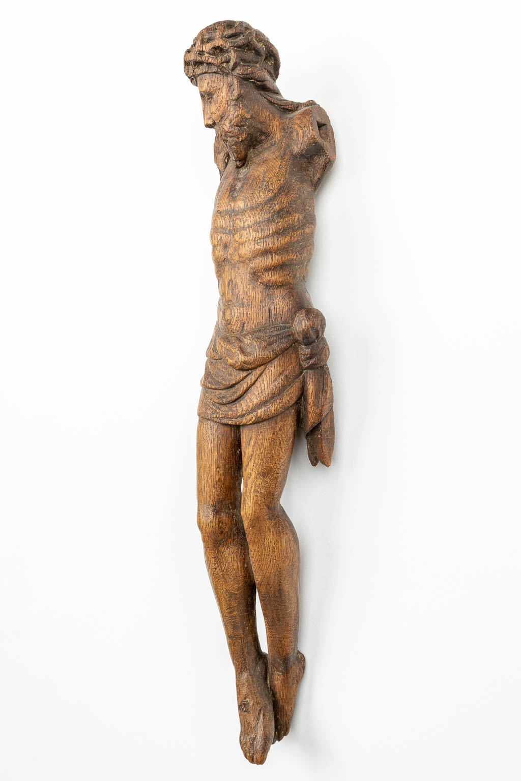 A wood sculptured corpus with a crown of thorns, 18th century. (H:76cm)