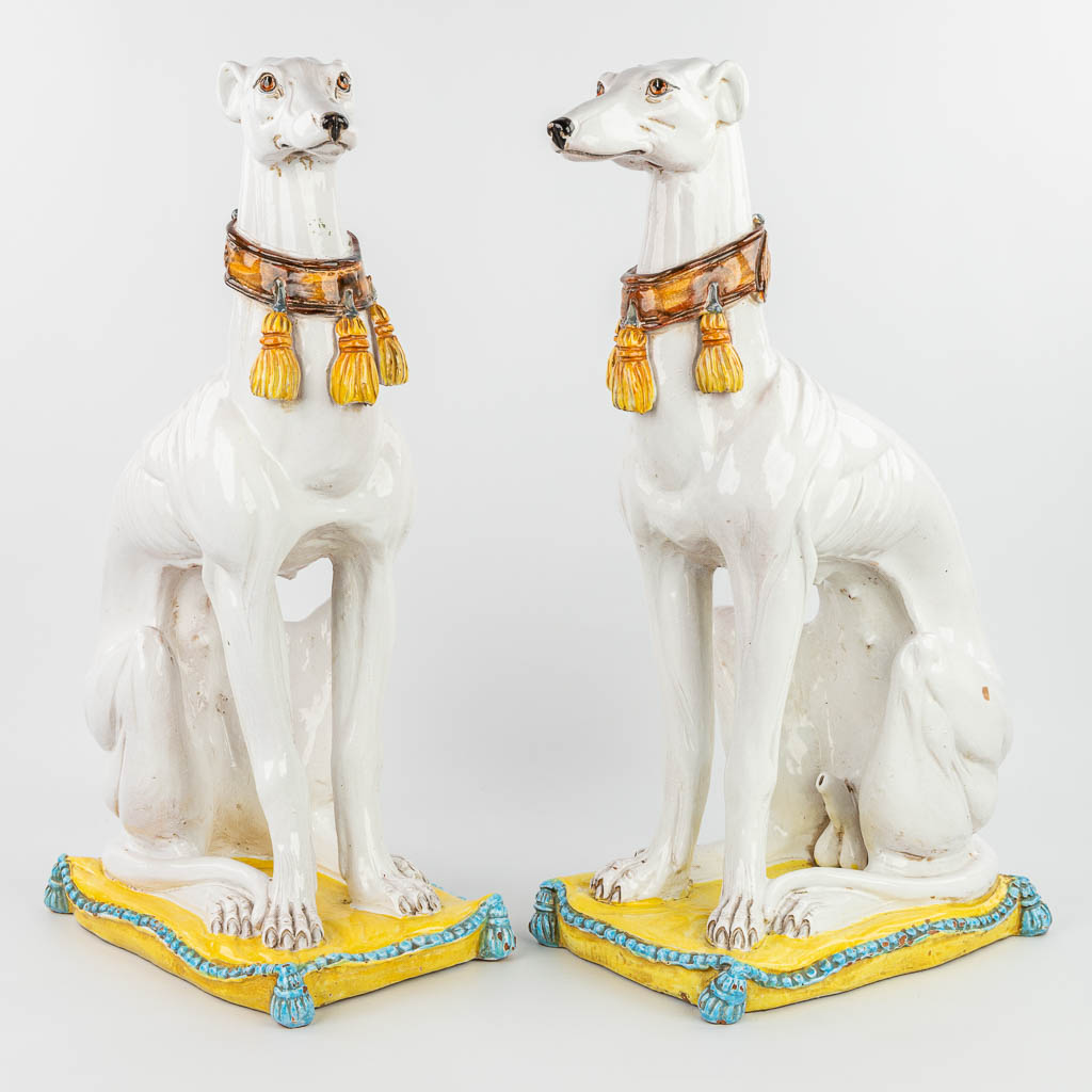 A pair of 2 mid-century greyhounds made of glazed terracotta, made in Italy. (H:67cm)