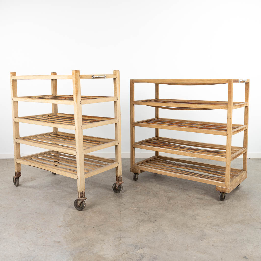 A set of 2 bakers carts, made of wood. (H:117cm)