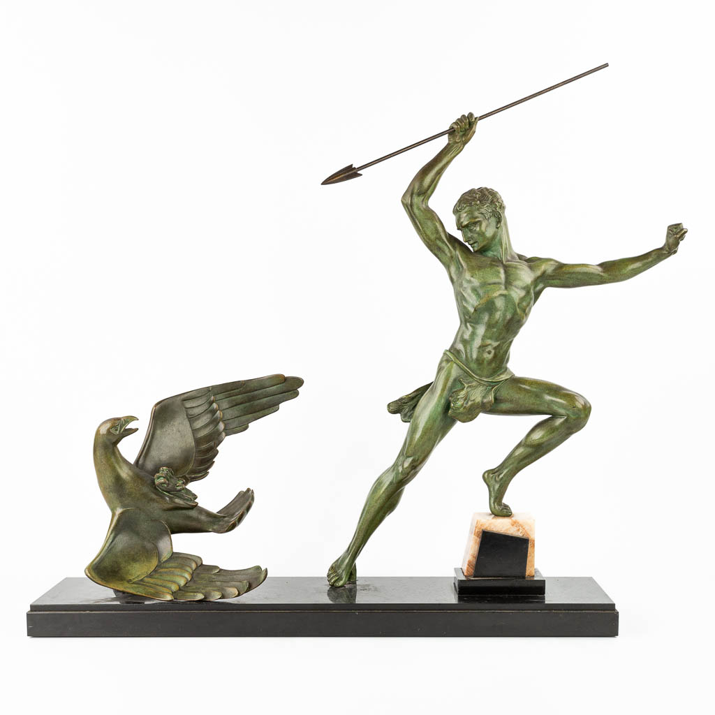 Jean DE RONCOURT (XIX-XX) 'Hunter with eagle', an art deco statue made of spelter. (H:66cm)