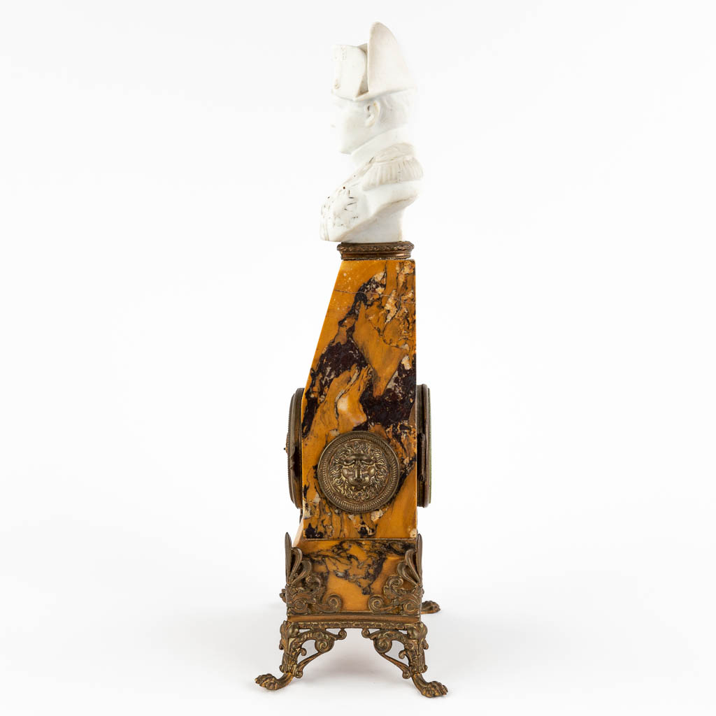 A mantle clock with an image of Napoleon Bonaparte, Marble and bisque porcelain. Circa 1880. (D:9 x W:13 x H:32 cm)