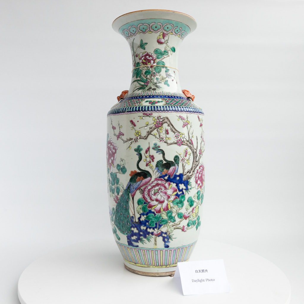 A vase made of Chinese porcelain, decorated with antiquities and peacocks. 19th century. 