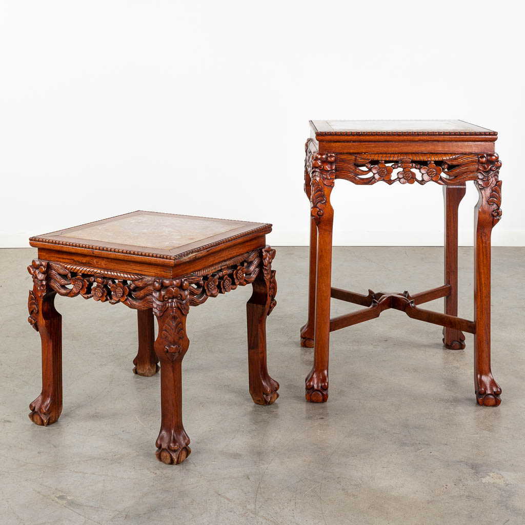 Two Oriental hardwood stands with a marble top. 20th C. (D:50 x W:50 x H:70 cm)