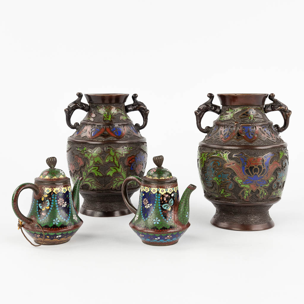  A pair of vases and pitchers, champslevé enamel on bronze base. 20th century.