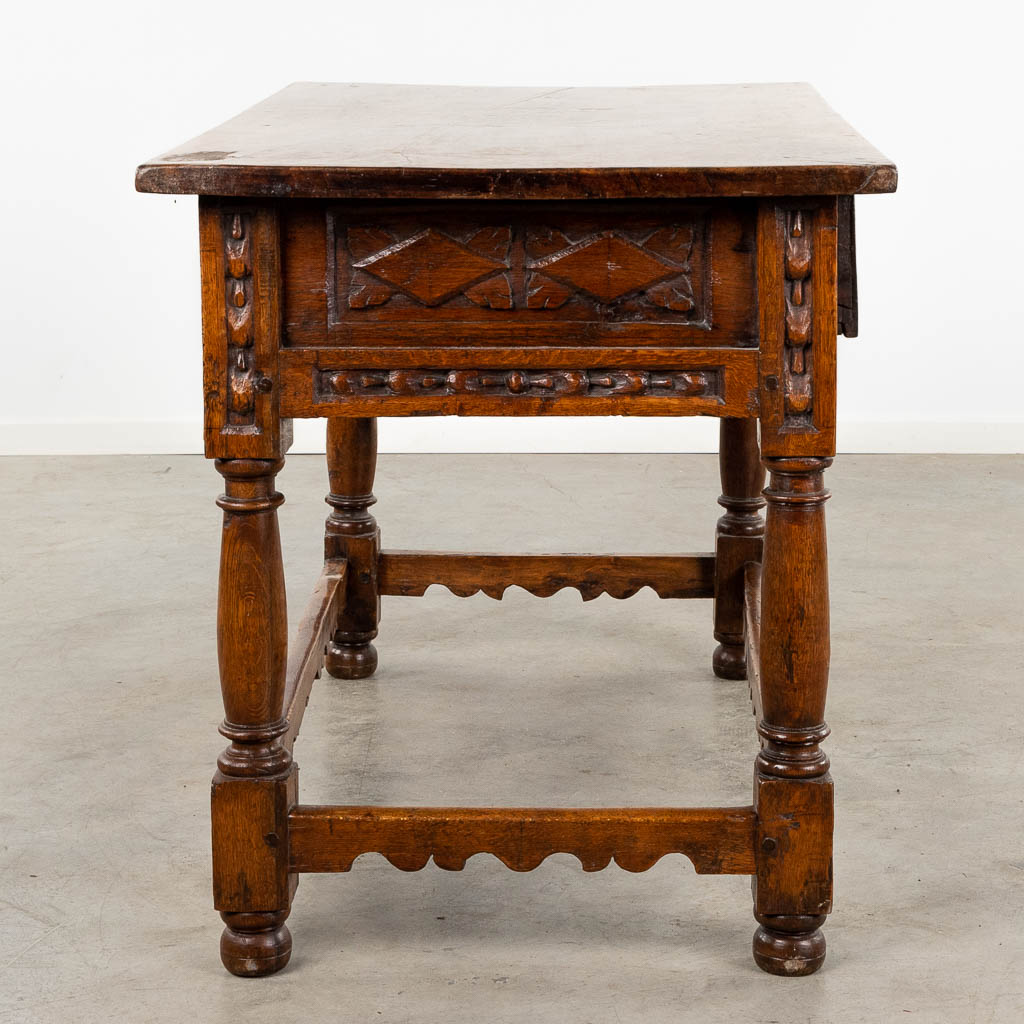 An antique "Table De Milieu", sculptured wood. Spain, 18th C. (D:72 x W:127 x H:82 cm)