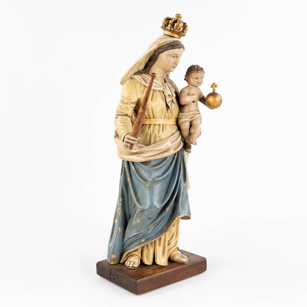 An antique wood-sculptured and polychrome statue of Madonna with child. Circa 1900-1920. (L: 11 x W: 20 x H: 46 cm)