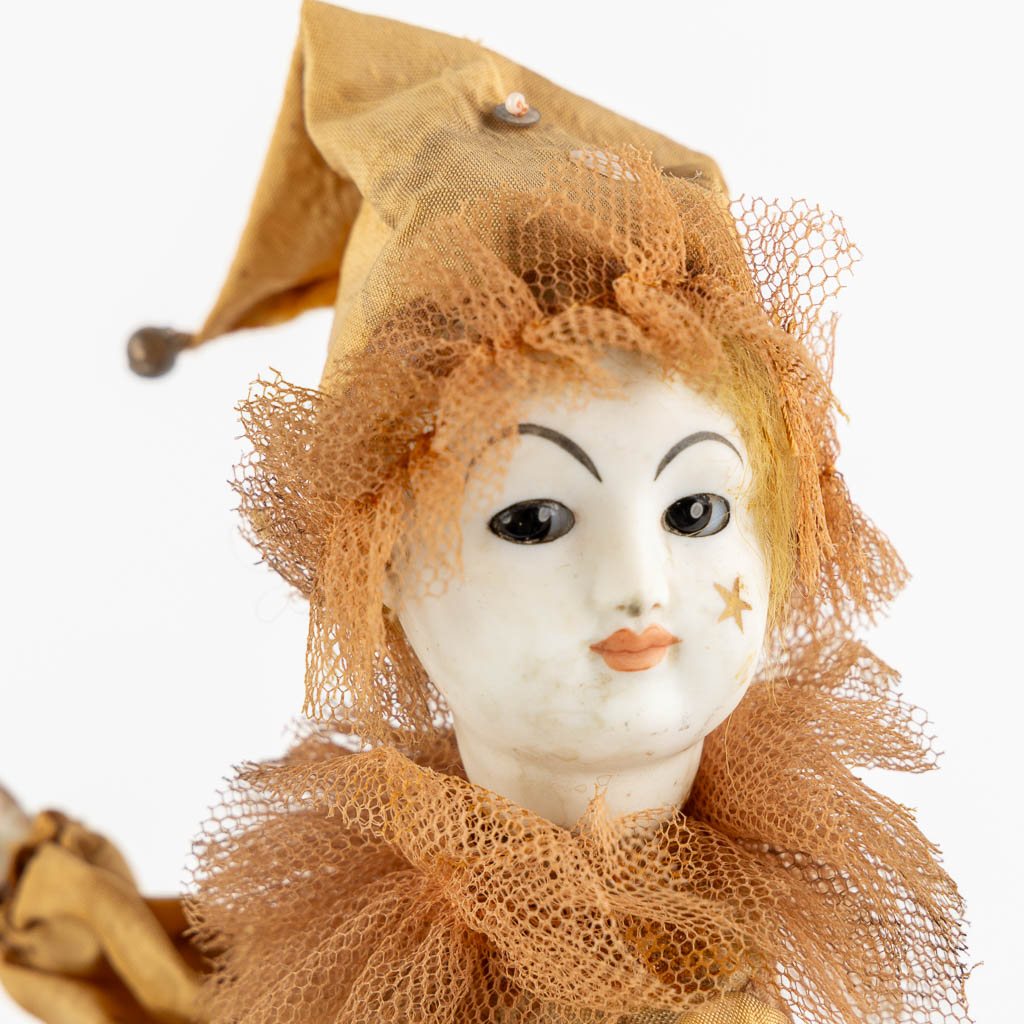 A 'Pierrot' automata with moving hands and head. (L:8 x W:17 x H:33 cm)