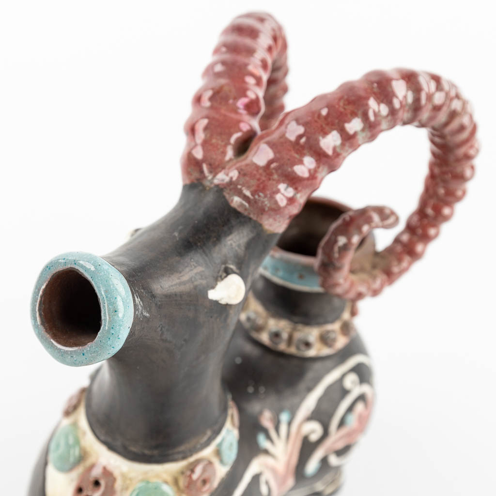 A pitcher in the shape of an Ibex. (H:20,5cm)
