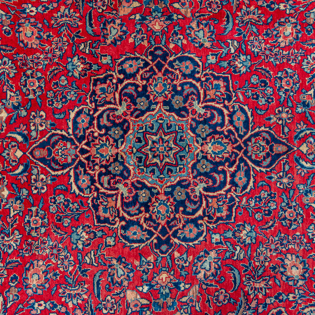 An Oriental hand-made carpet. (204 x 134 cm)
