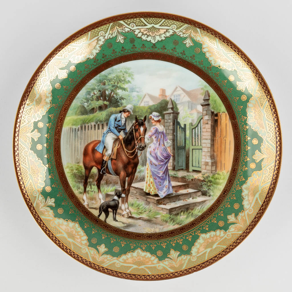 Vienna Porcelain, a set of 9 plates with printed decor. 20th C. (D:25 x W:27 cm)