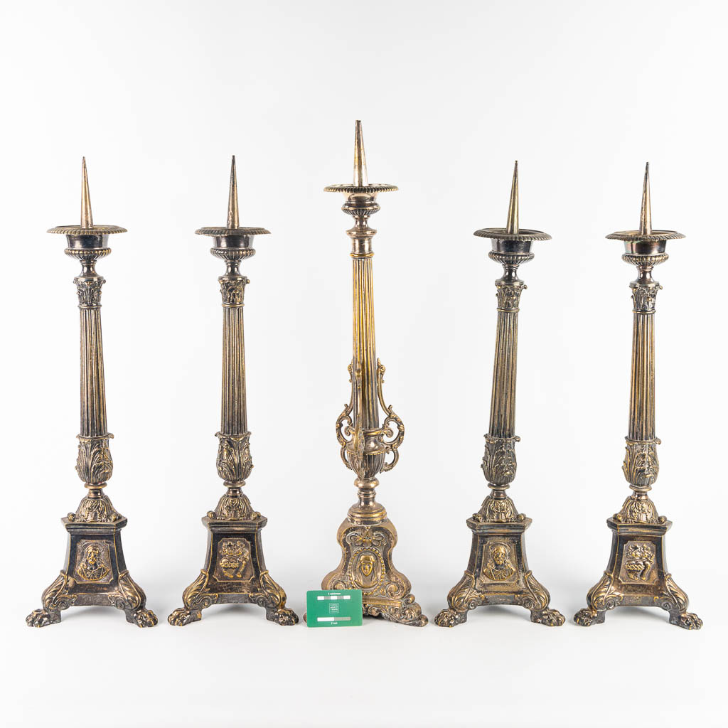 A collection of 5 church candlesticks made of silver-plated metal and holy figurines. (H:76cm)