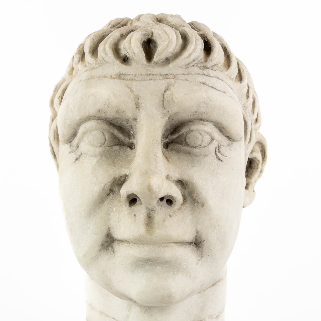 Head of a man, sculptured Carrara marble. 19th C. (L:19 x W:24 x H:30 cm)