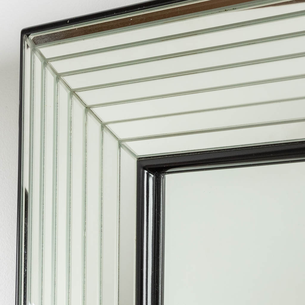 Deknudt, a mirror. 20th C. (W:63 x H:84 cm)