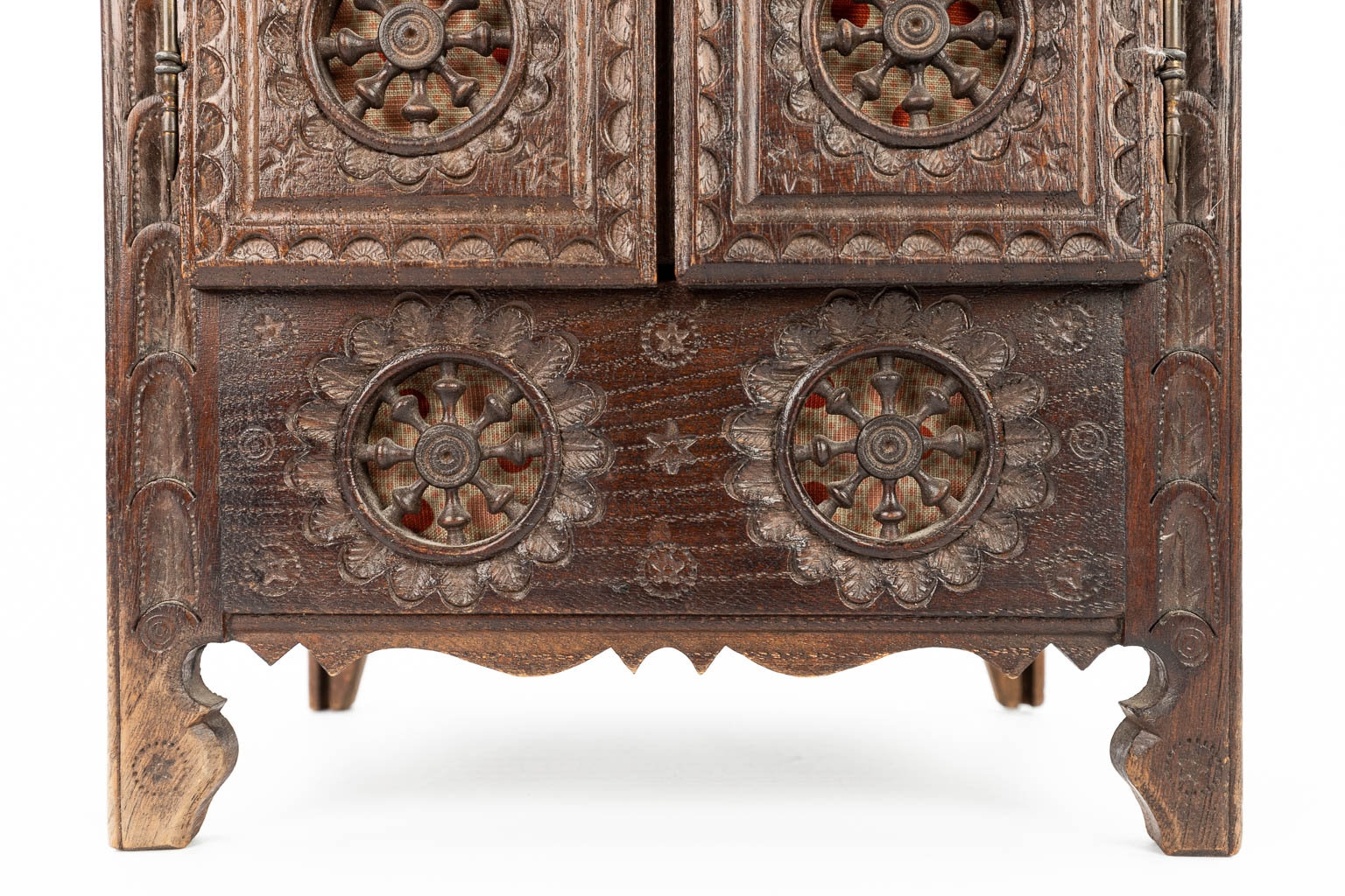 A miniature Breton cabinet, made of sculptured wood. (H:37cm)