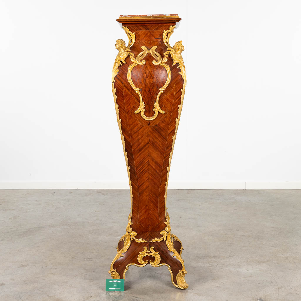 A pedestal, Louis XV style finished with rosewood inlay and mounted with gilt bronze. 19th C. (L: 37 x W: 37 x H: 125 cm)