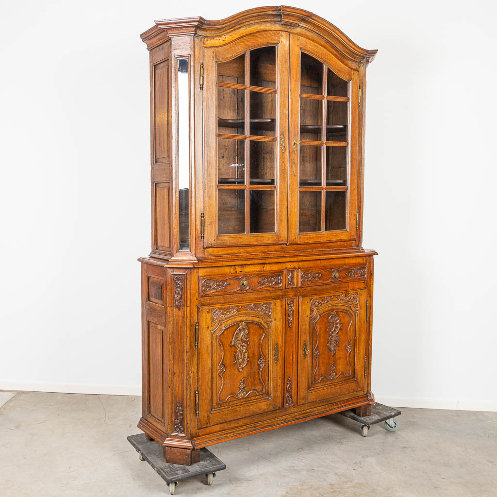 A 'Deux Corps' display cabinet, made of oak in Namur, Belgium. (48 x 162 x 255cm)