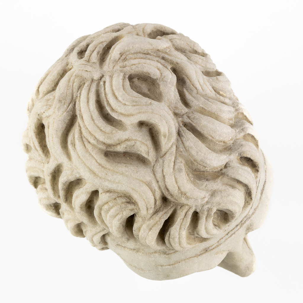 Head of a man, sculptured Carrara marble. 19th C. (L:19 x W:24 x H:30 cm)