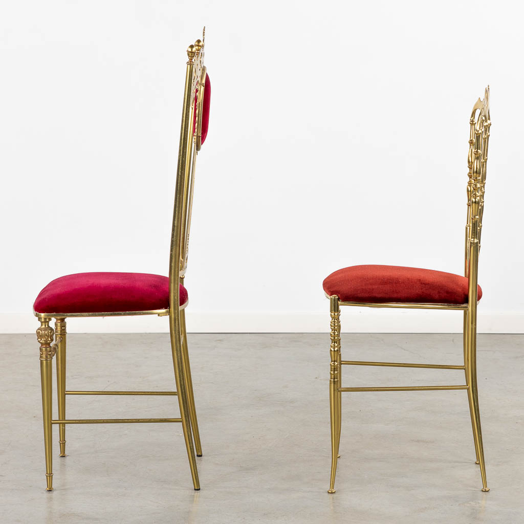 Two Metal and gilt chairs, circa 1970. (L:40 x W:40 x H:108 cm)