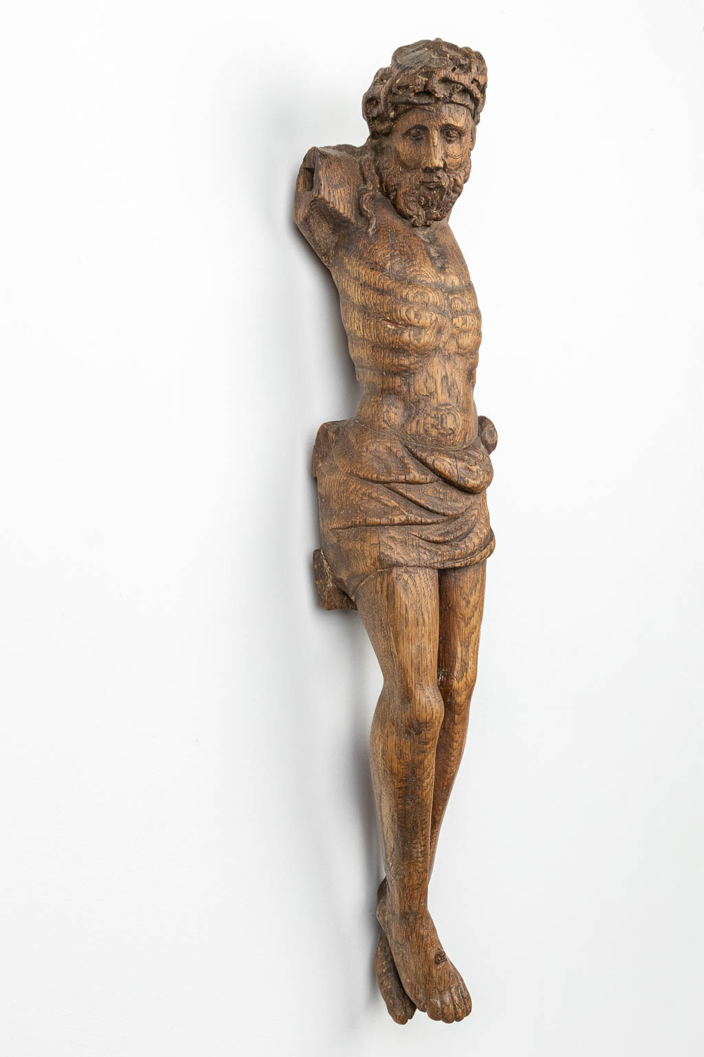 A wood sculptured corpus with a crown of thorns, 18th century. (H:76cm)