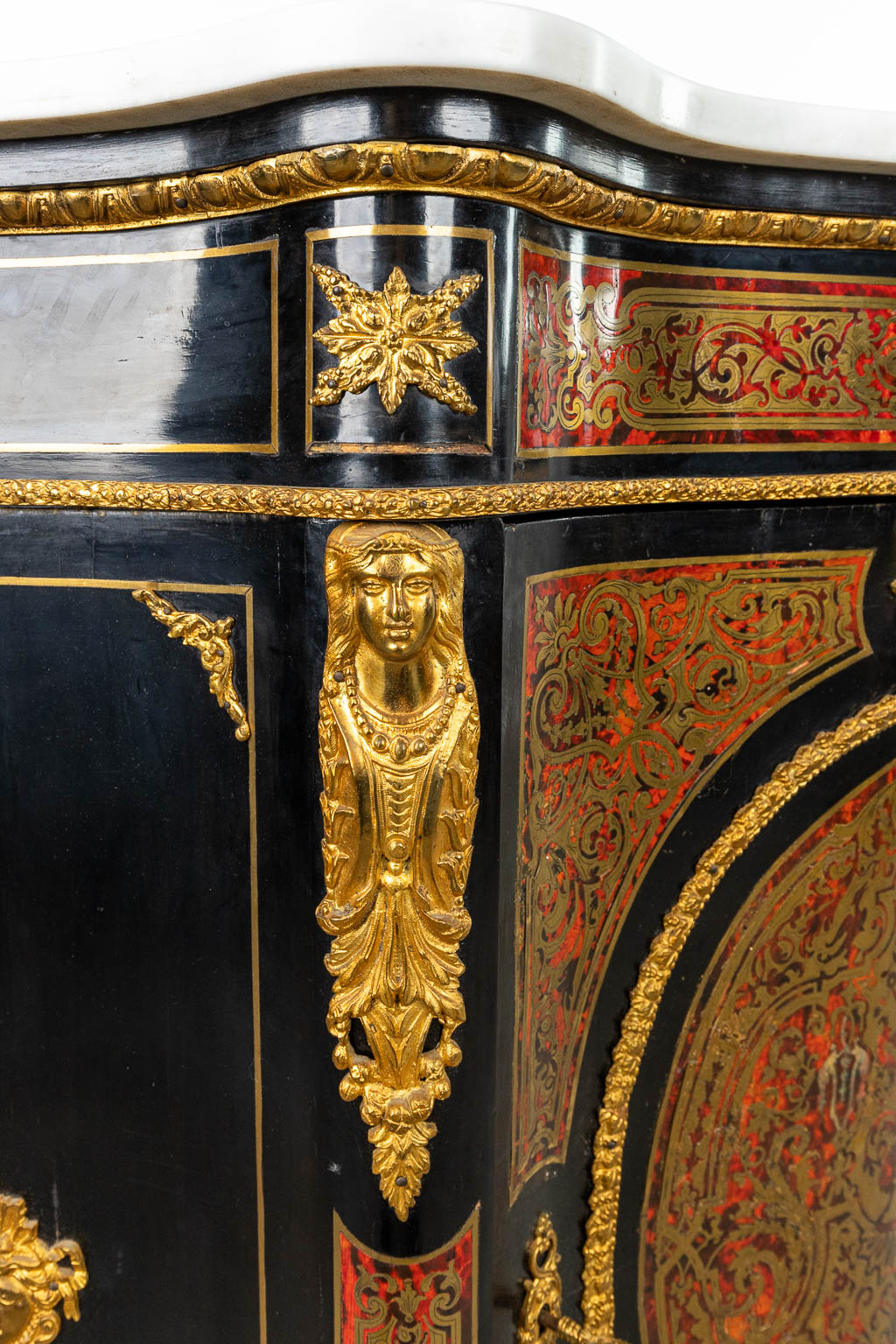 A cabinet with marble top made in Napoleon 3 style, mounted with bronze and finished with boulle tortoiseshell. (H:106,5cm)