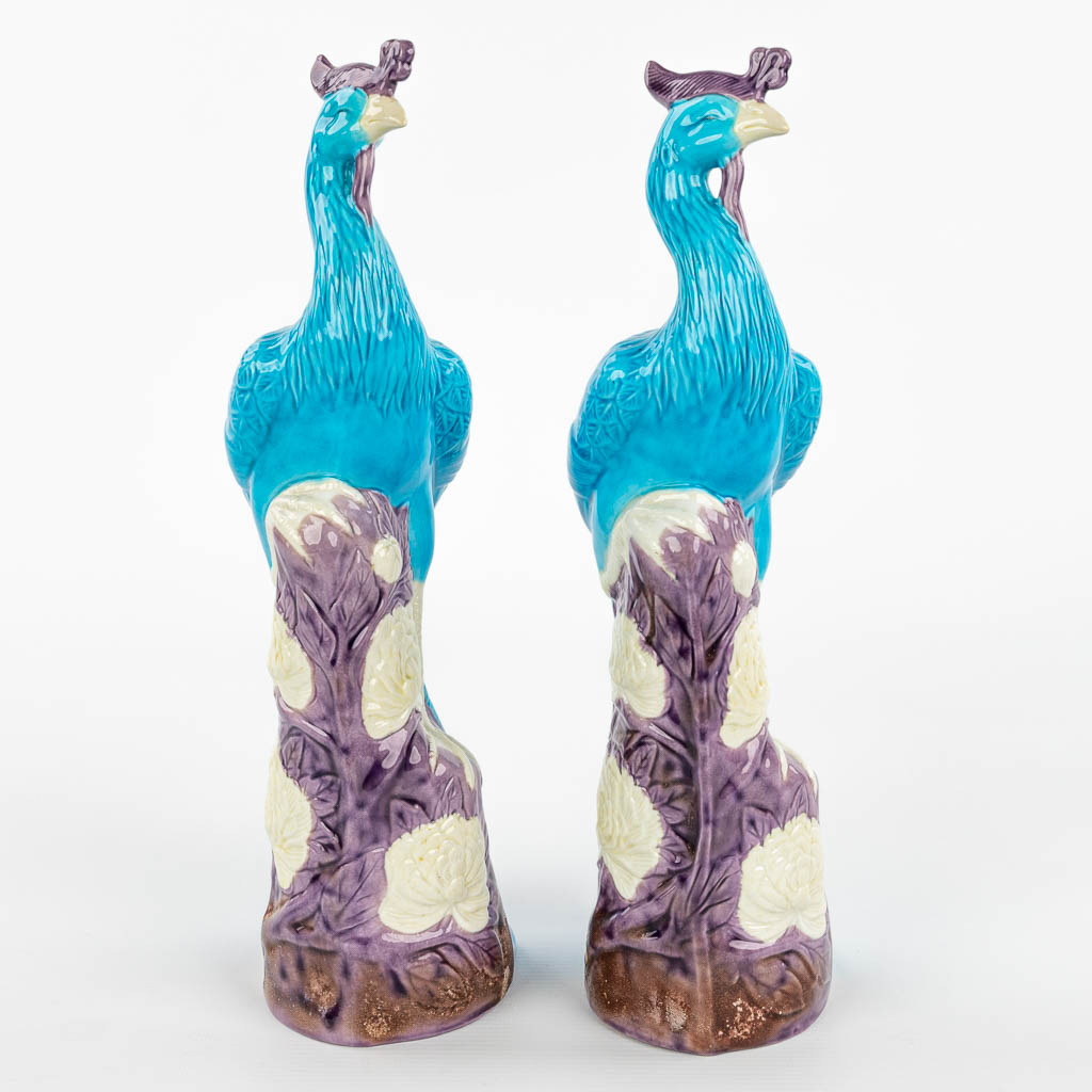 A pair of Chinese Phoenix made of glazed stoneware. 20th century. (H:30cm)