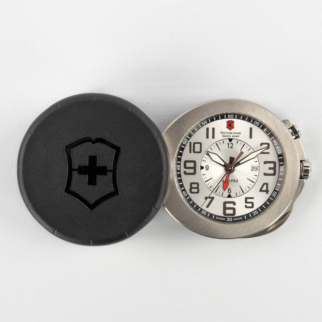 Victorinox, a travel alarm clock in the original box. Limited edition, 2010. (W:5,6 cm)