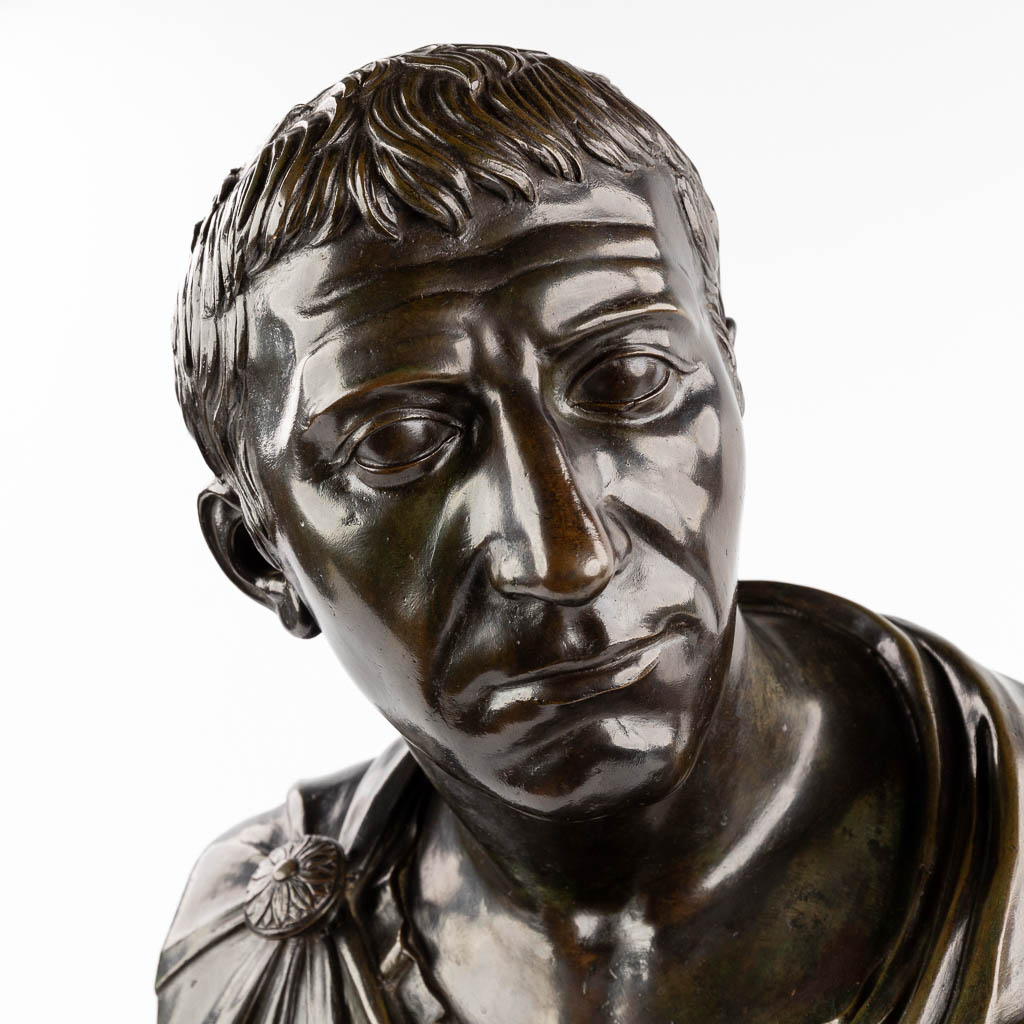 The Roman Senator Brutus, a bust, patinated bronze mounted on a marble base. (D:29 x W:39 x H:62 cm)