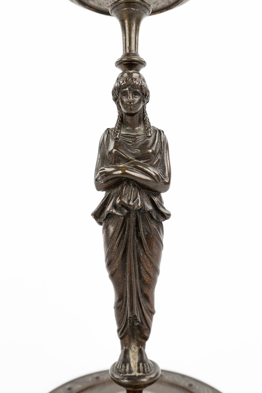 A pair of caryatid candlesticks, Empire style, patinated bronze, 19th century. (H:23cm)