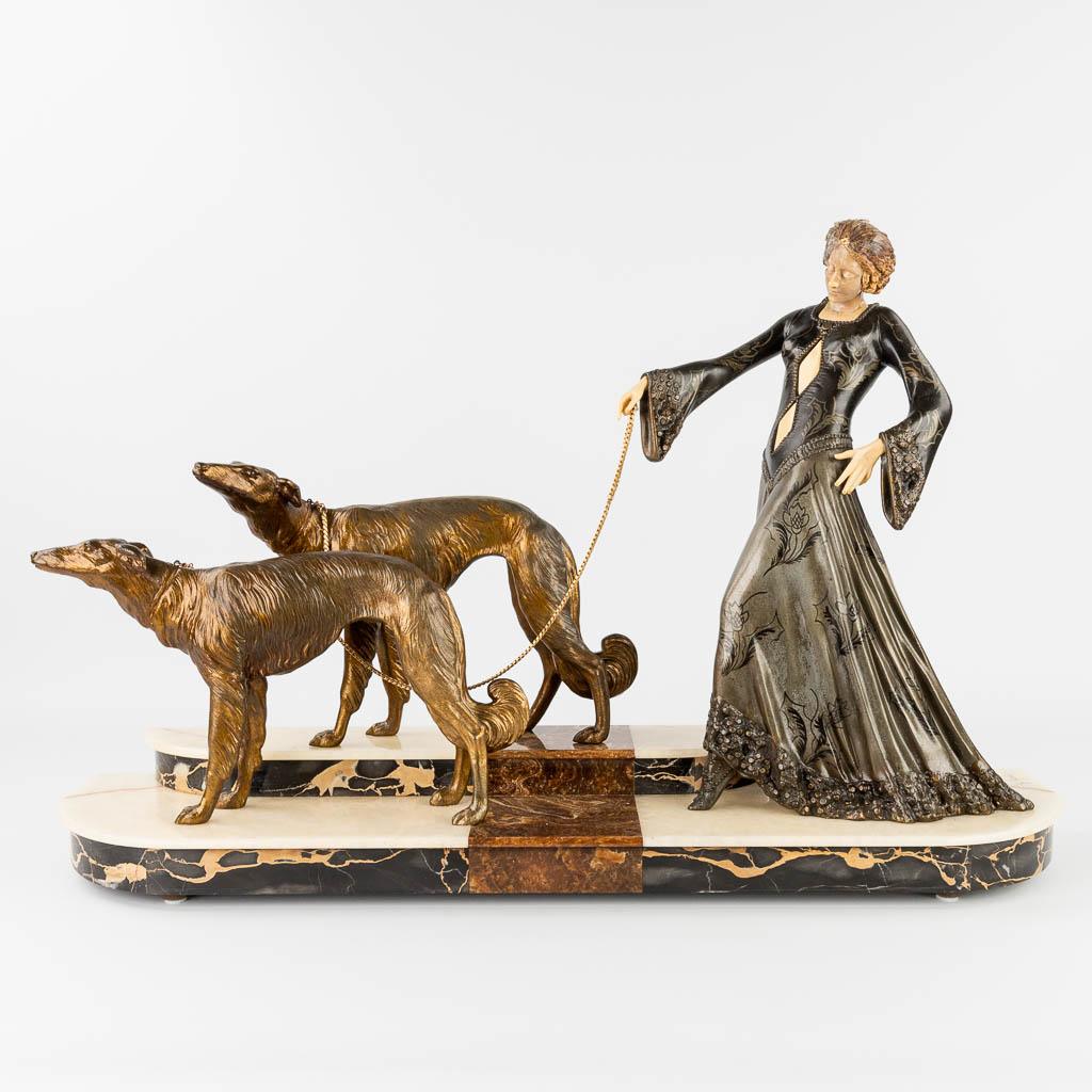  Giorgio GORI (XX) "Lady with greyhounds" a statue made in art deco style. (L:21 x W:80 x H:51 cm)