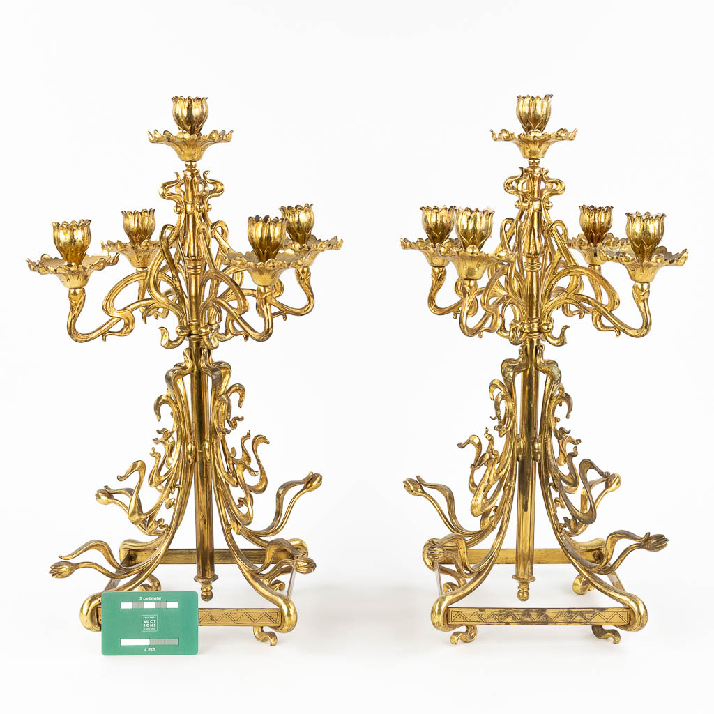 A pair of candelabra, brass in art nouveau periode. Circa 1900. 