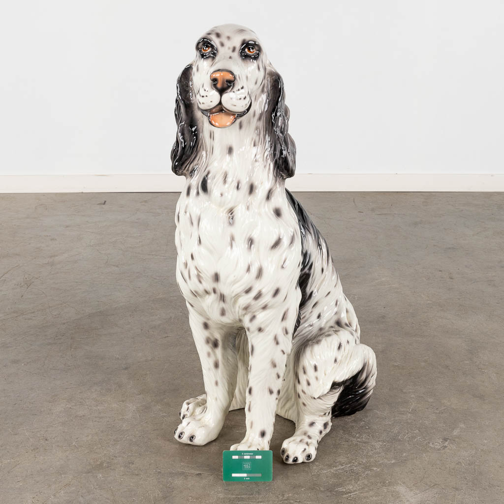 A dog, glazed faience, Italy. 20th C. (D:45 x W:34 x H:76 cm)