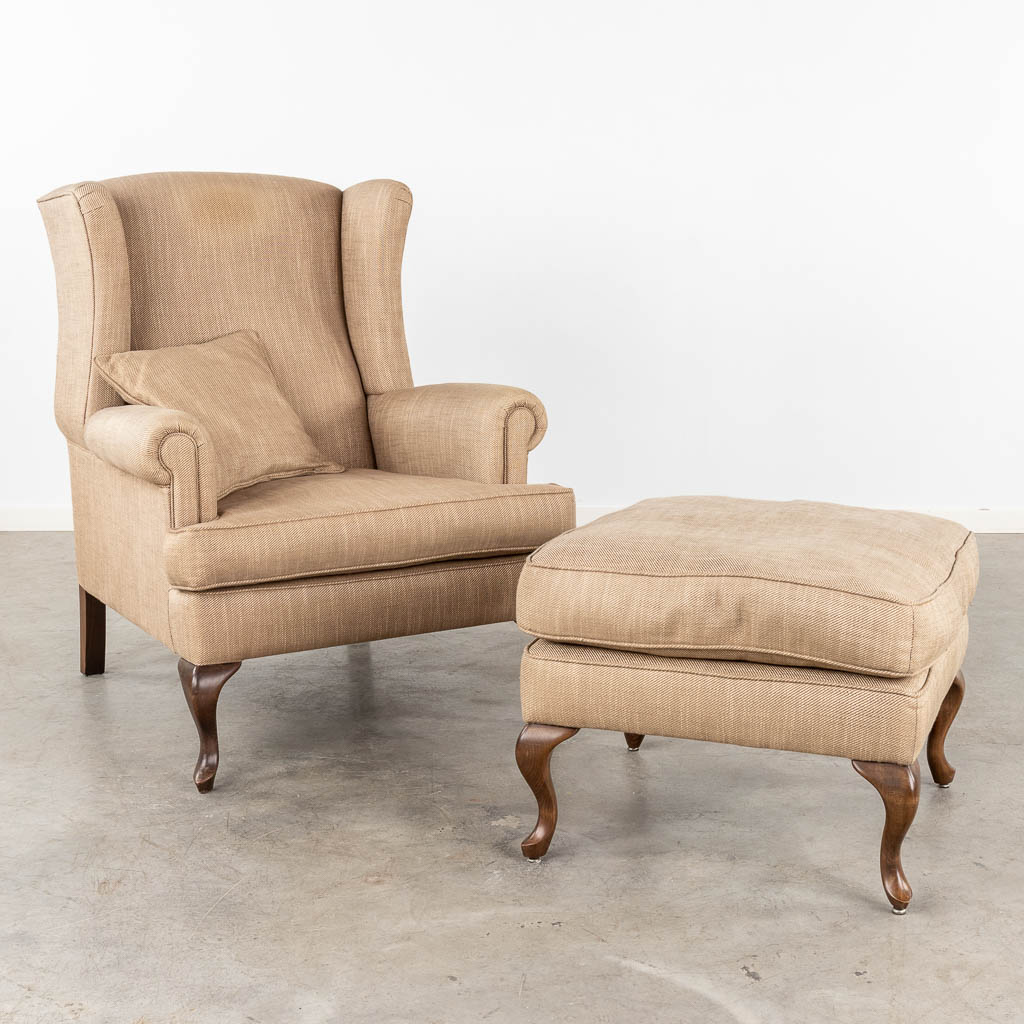 Marie's Corner, a wingback chair with ottoman. 21st C. (D:90 x W:84 x H:103 cm)