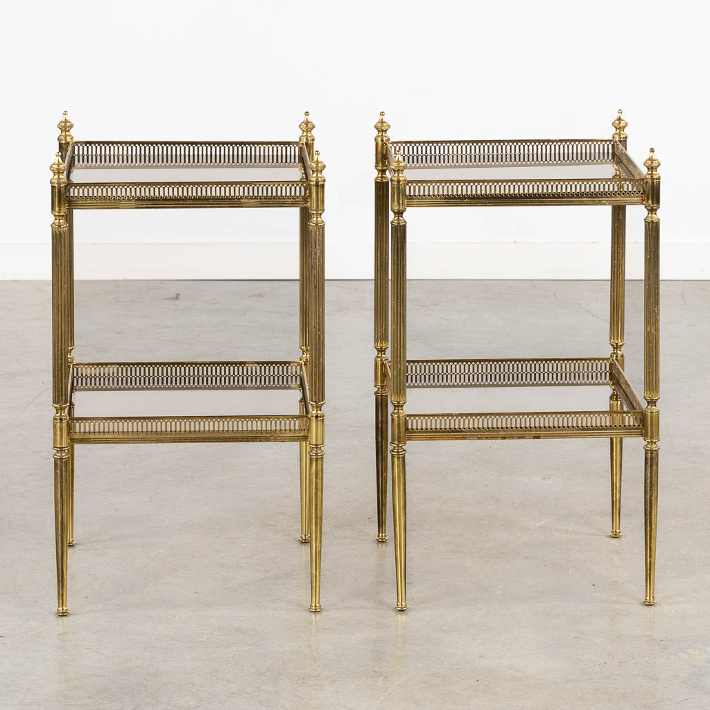 A pair of two-tier side tables in the style of Maison Jansen. (L:34 x W:34 x H:59 cm)