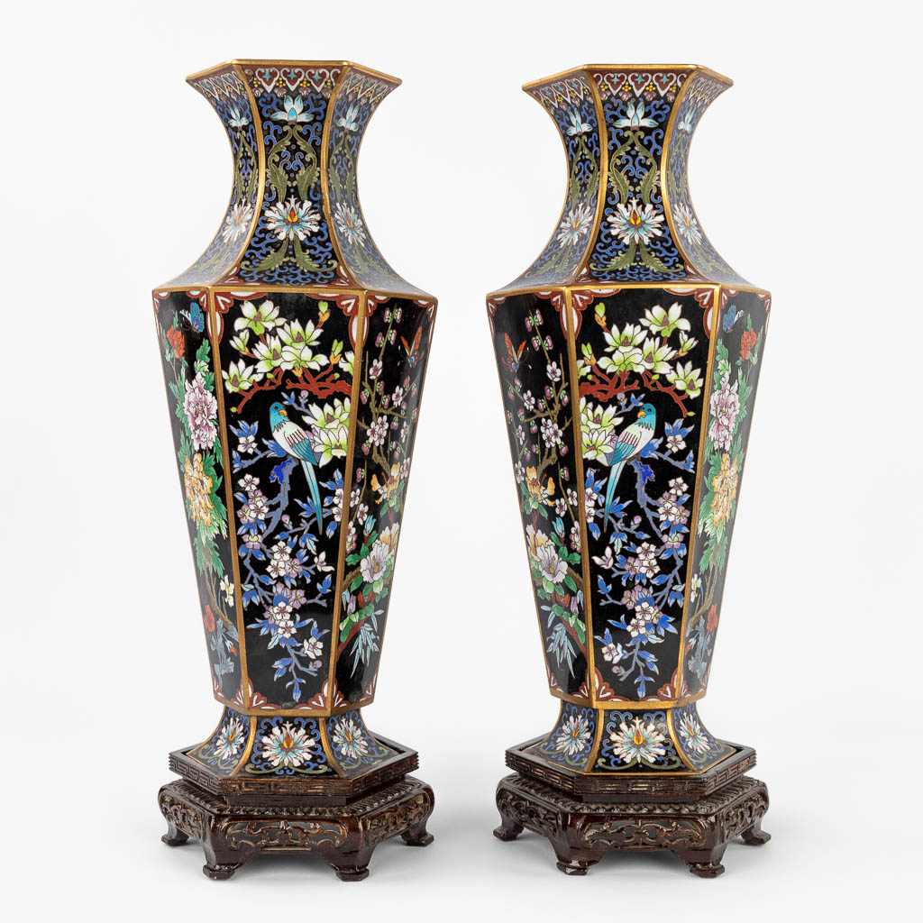A pair of sextagonal Cloisonné vases decorated with fauna and flora.  (L:14 x W:14 x H:39 cm)