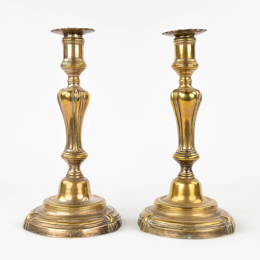 A collection of 3 pairs of candlesticks, 19th Century. (H: 27 cm)
