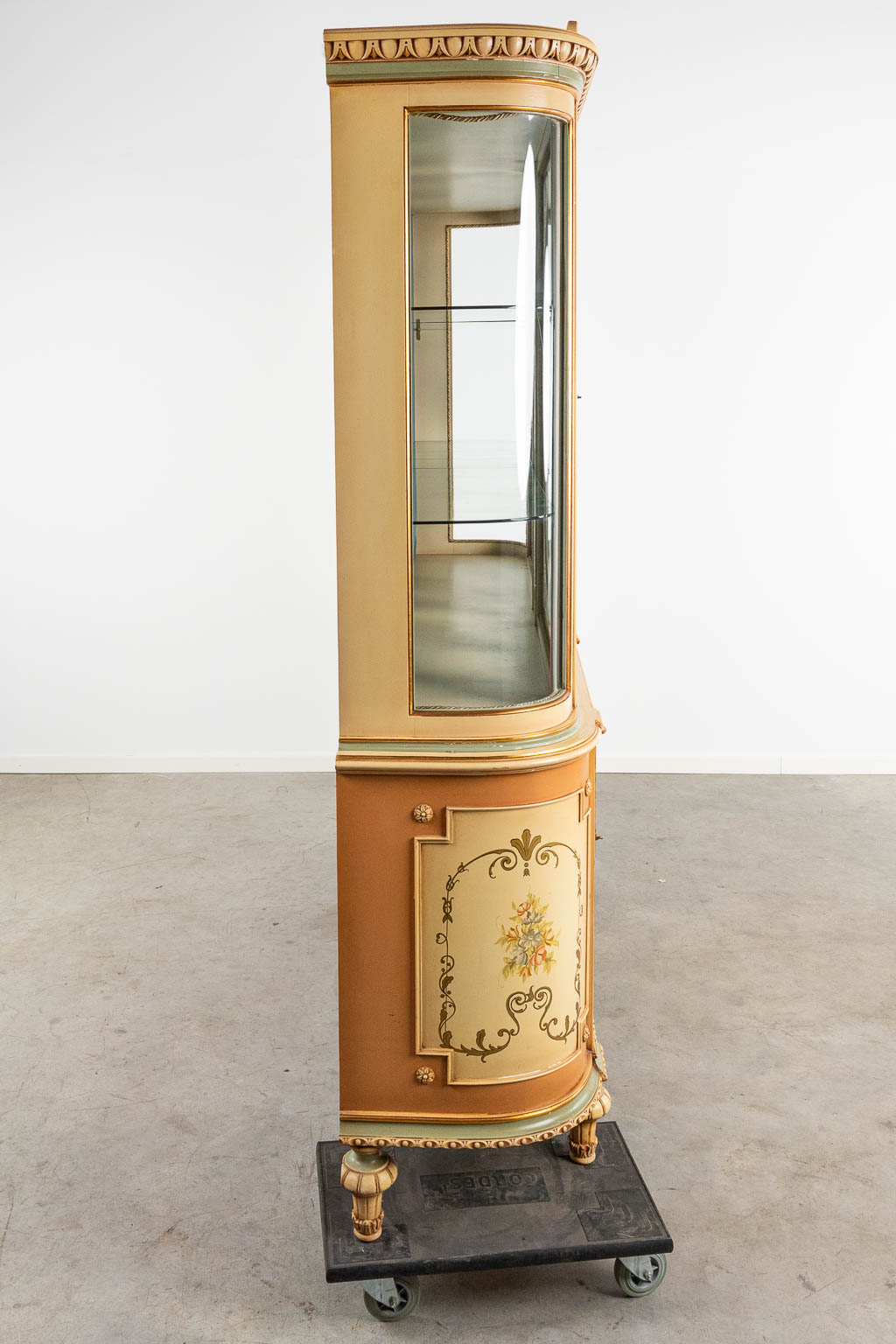 A display cabinet made of patinated wood in Italian style. (H:225cm)
