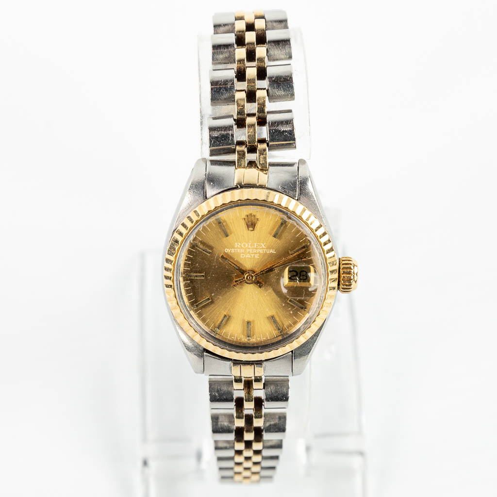 A Rolex Oyster Perpetual Date ladies model made of steel and 18 karats yellow gold. 