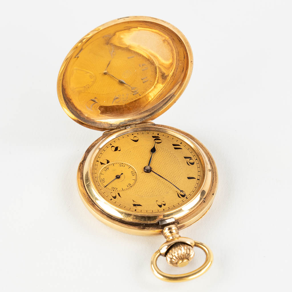 A 14 karat gold pocket watch. 20th C. (W:51 cm)