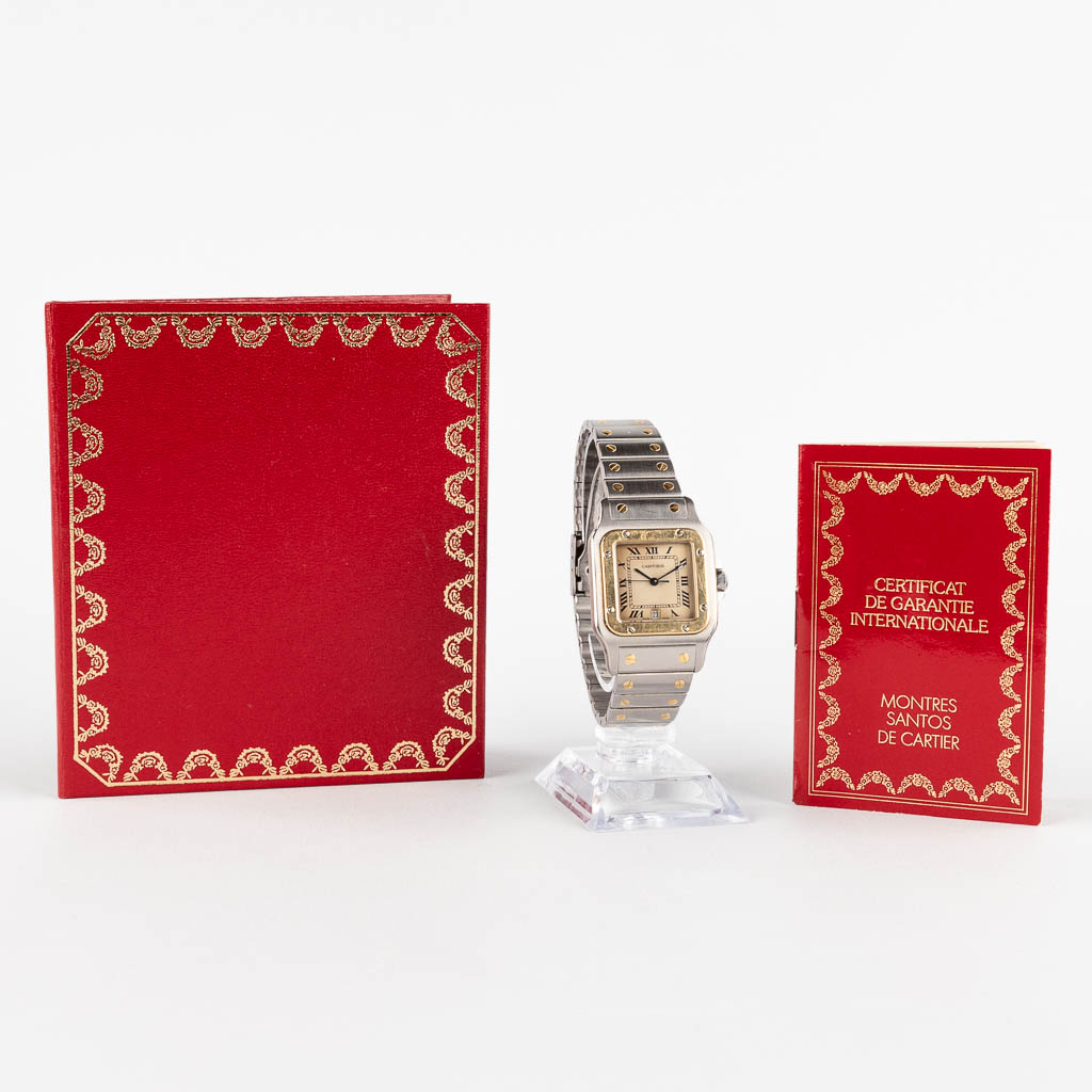 Cartier Santos, a men's wristwatch, steel and gold-plated. Quartz. 1990.  (W:2,9 x H:4,1 cm)