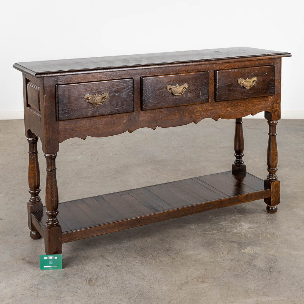 An English console table with 3 drawers. 20th C. (D:35 x W:120 x H:77 cm)