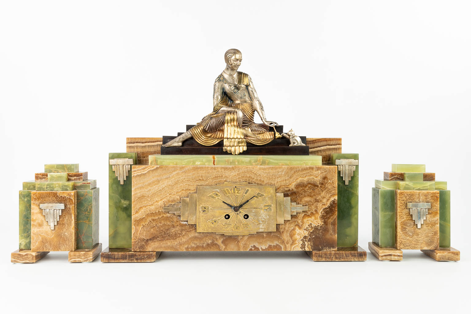 Armand GODARD (XIX-XX) An art deco three-piece garniture clock, onyx with a silver- and gold-plated bronze figurine. (H:44cm)
