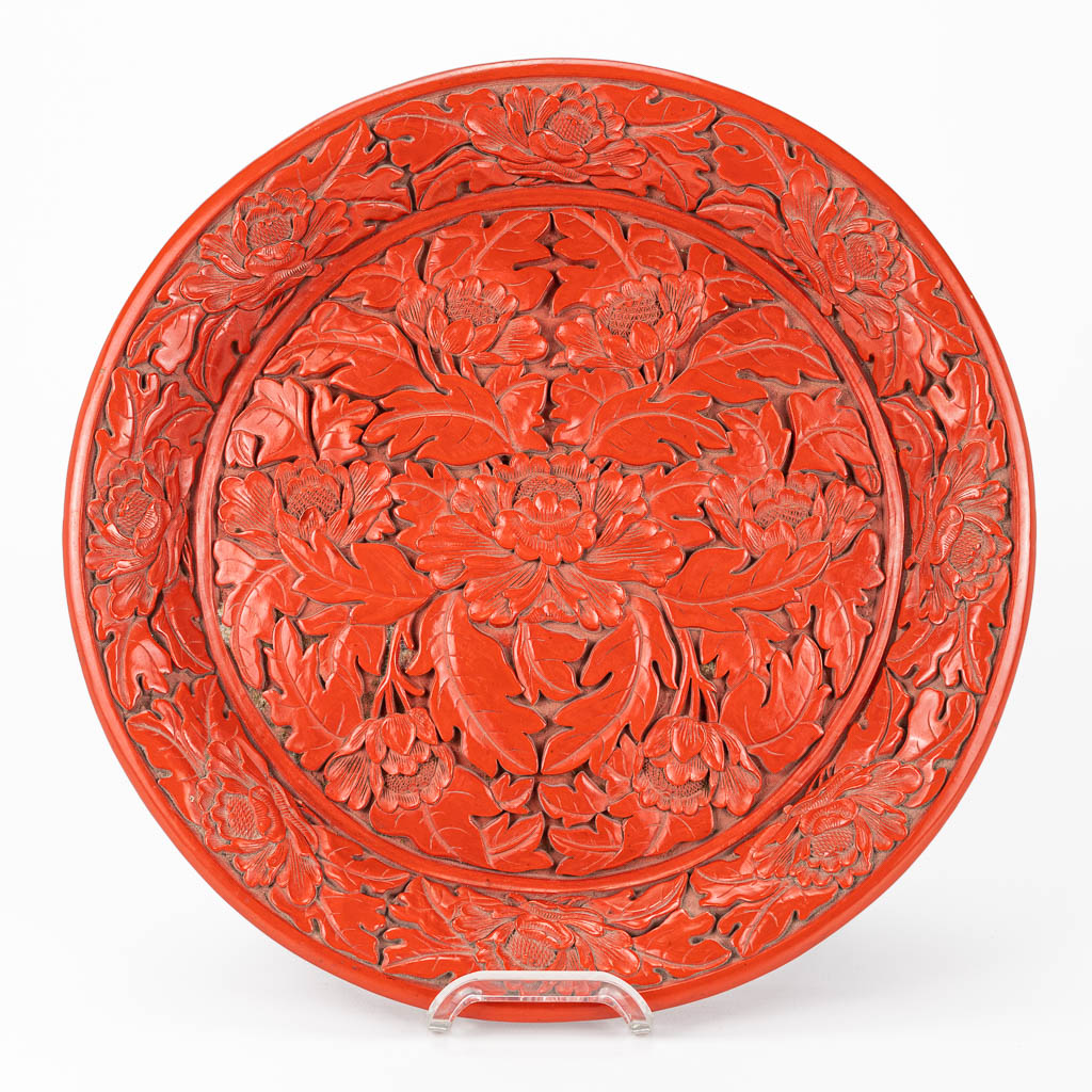 A plate made of lacquered cinnabar and made in China. 