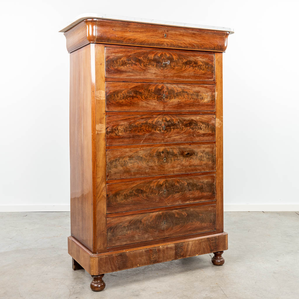 A 7-drawer cabinet made in Louis Philippe style and finished with a marble top. (H:146cm)