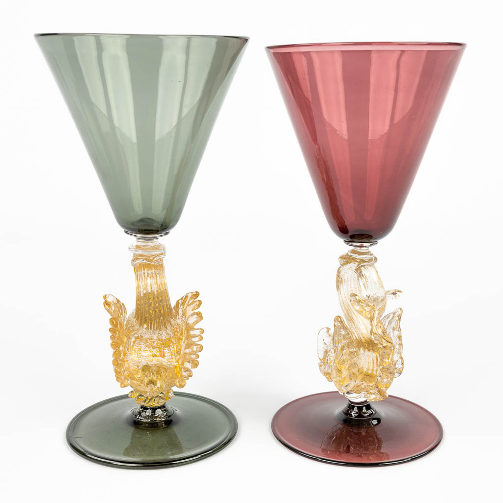 A pair of Venetian Goblets with a stem of a swan and fish, marked Venini, Murano. Made in Italy. (H:20,5cm)